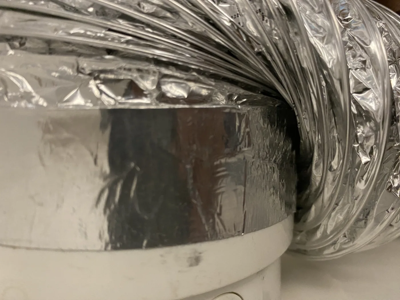 Dryer transition and vent area inspected during dryer vent cleaning.