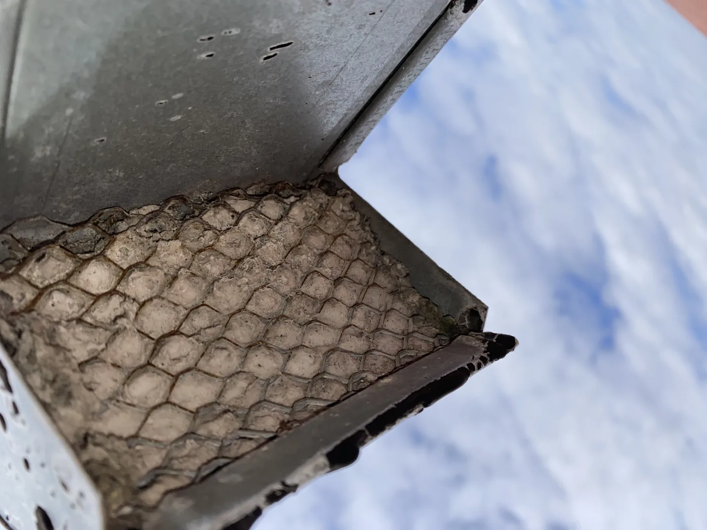 Dryer vent buildup that can make clothes take longer to dry.